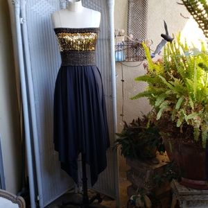 Sequined peaked strapless dress